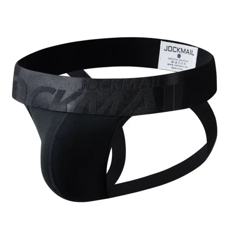Jockmail jockstrap in black. Closeup product shot showing front view of the contoured support pouch and heavy-duty waistband | color:black