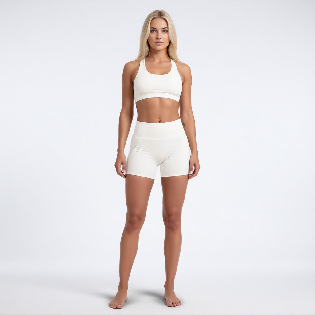 Women's high waisted gym shorts in ivory, front view showcasing the athletic performance silhouette | color:ivory