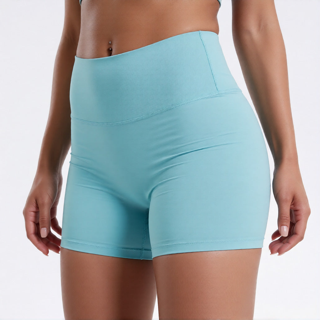 Women's high waisted gym shorts in light blue, showcasing the secure wide waistband and athletic performance silhouette | color:light blue