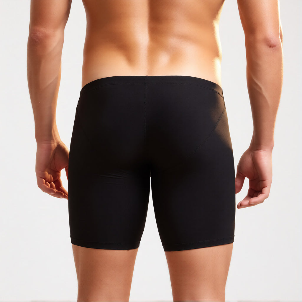 long leg boxer briefs in black, rear view showing the extended leg length and ultra-thin, sheer performance fabric | color:black