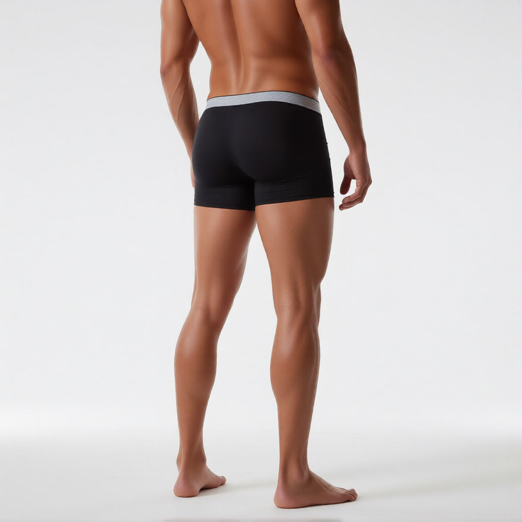 Men's boxer briefs with ball pouch in black, rear view showing the premium Modal fabric texture | color:black
