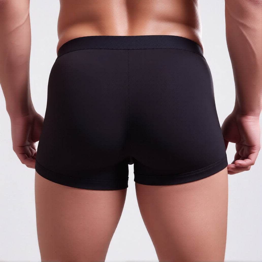 Men's C-ring boxer briefs in black in rear view, showing the enhancing support pouch and comfort waistband | color:black