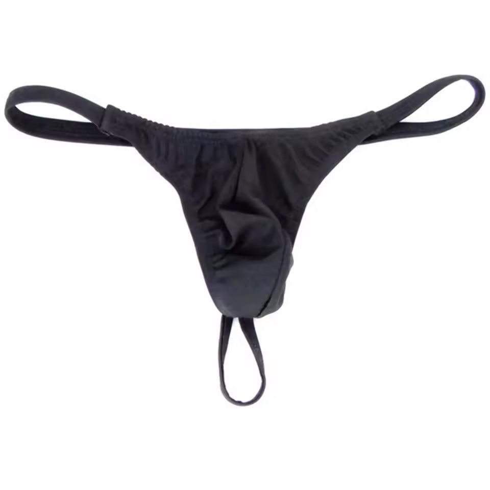Men's g-string in black laying flat | color:black