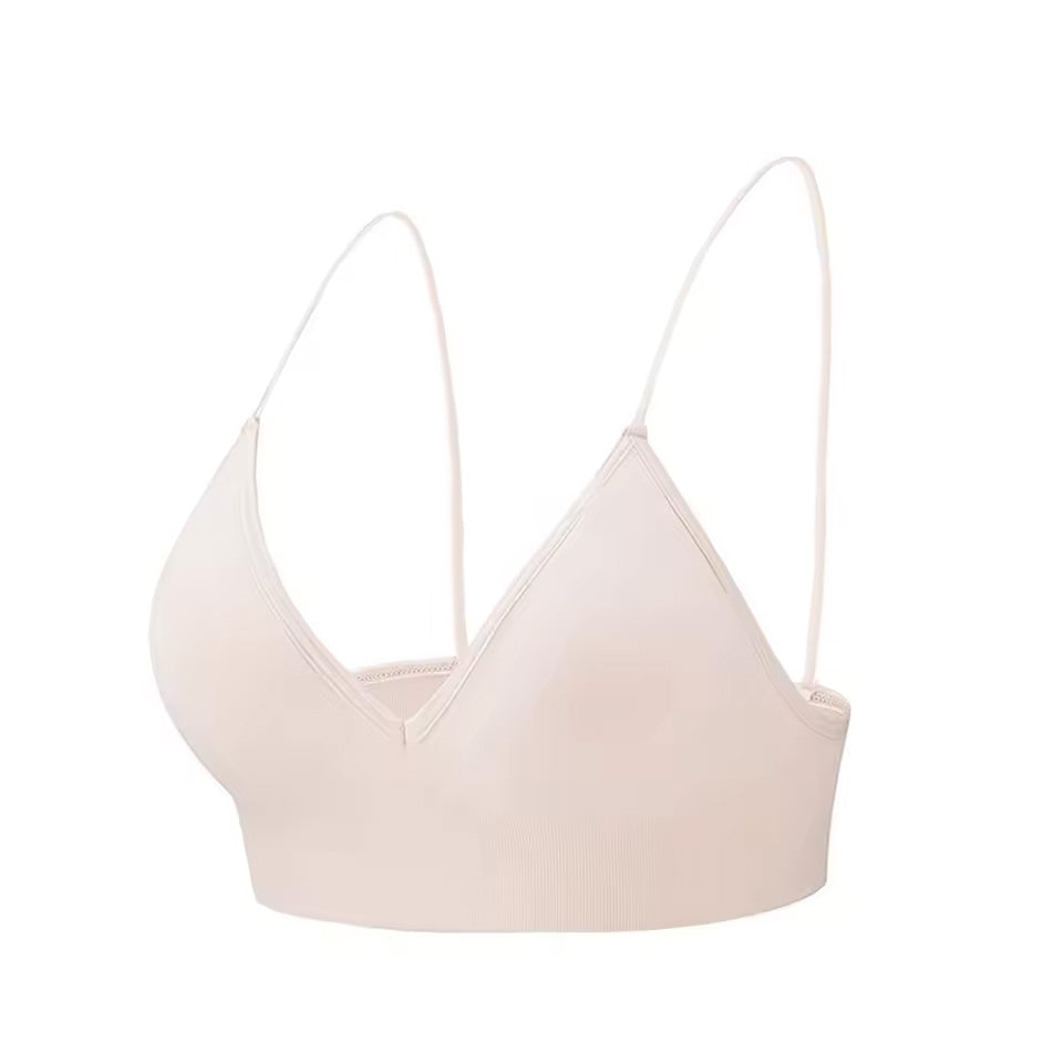 seamless bralette in nude with thin straps on a white background |color:nude