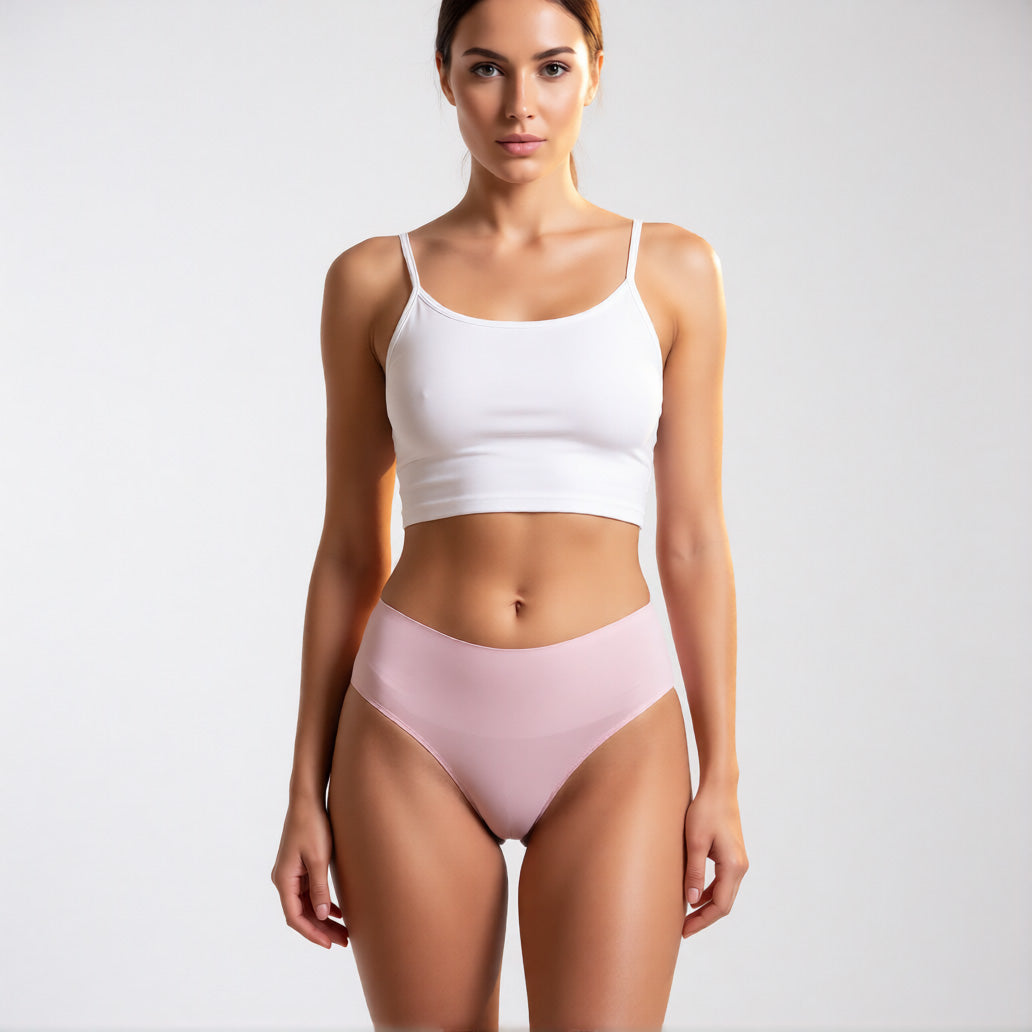 Seamless ice silk panties in pink shown from a front profile, featuring a mid-rise fit and no show construction. | color:pink