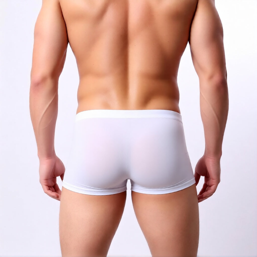 square cut trunks in white showing the square cut and athletic, low-rise fit from the rear | color:white